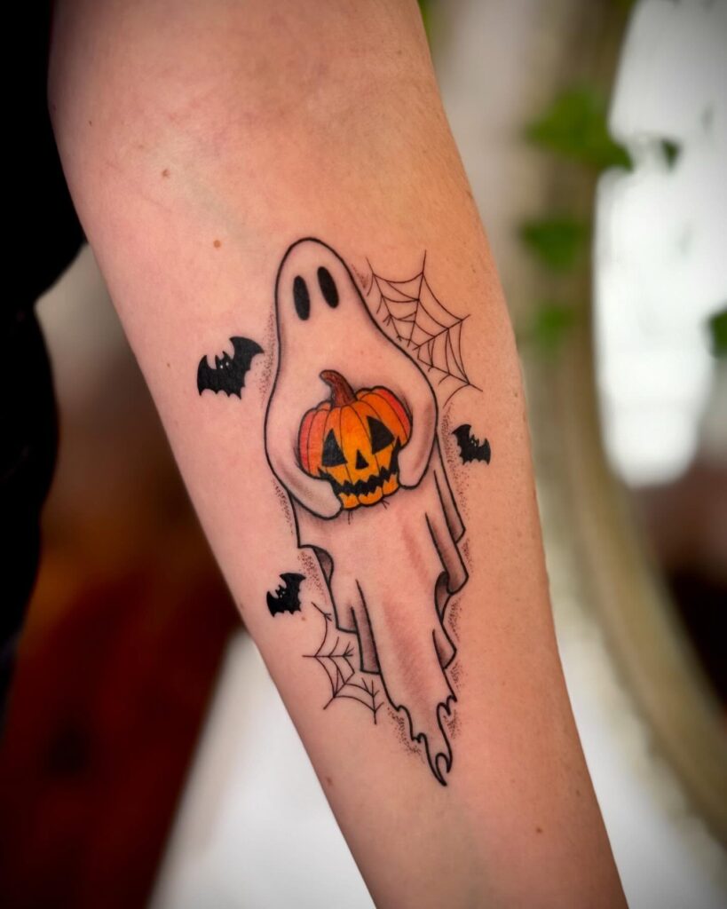 Fiery Jack O’ Lantern Tattoo with Glowing Blue Flames jack o lantern tattoo ideas tattoo