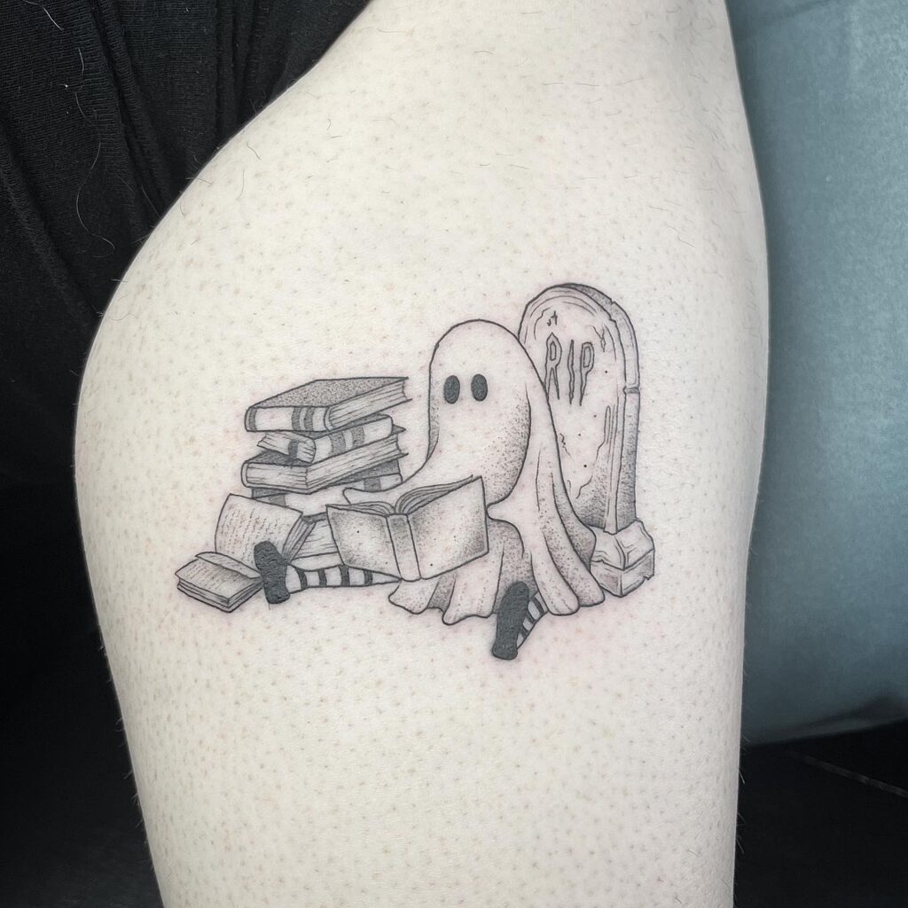 Stack of Books with Blooming Flowers and Crescent Moon book lover tattoos tattoo