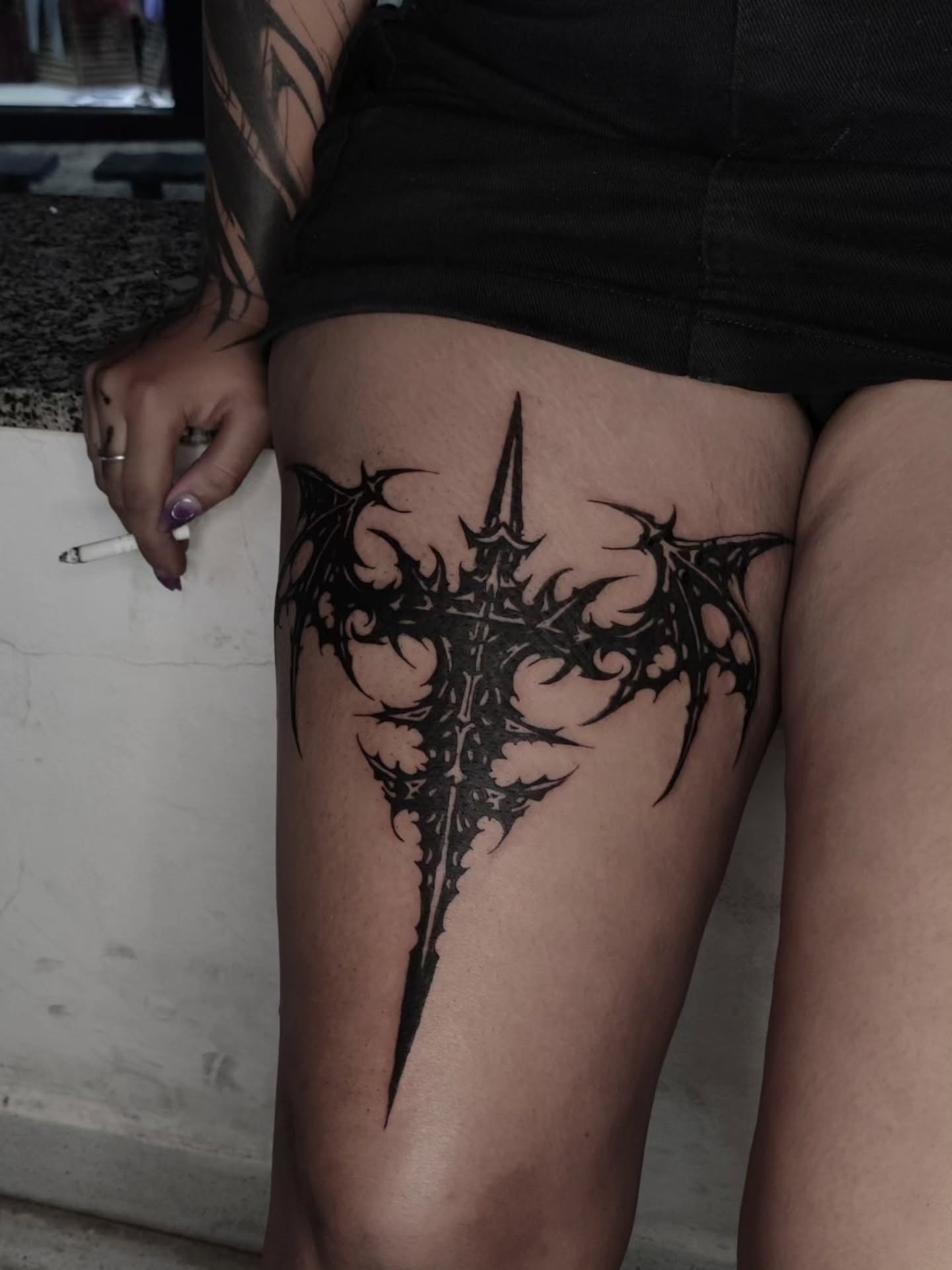 Raven And Wolf Medallion Tattoo