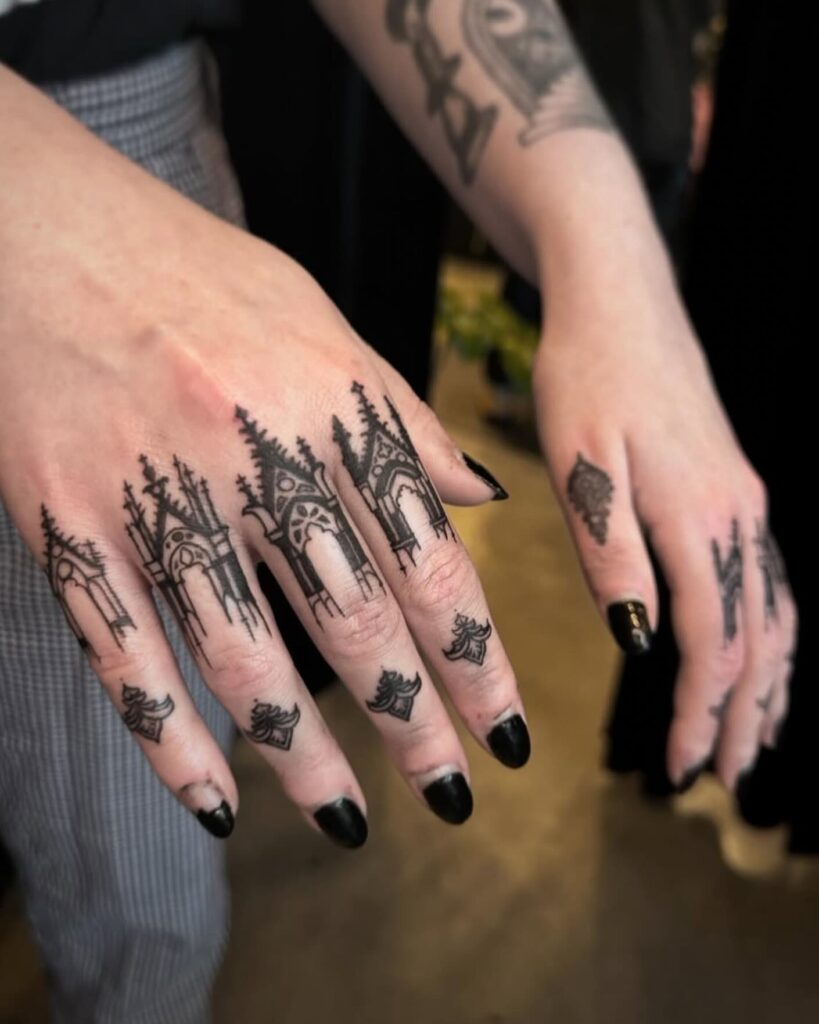 Elegant Ornamental Finger Tattoo