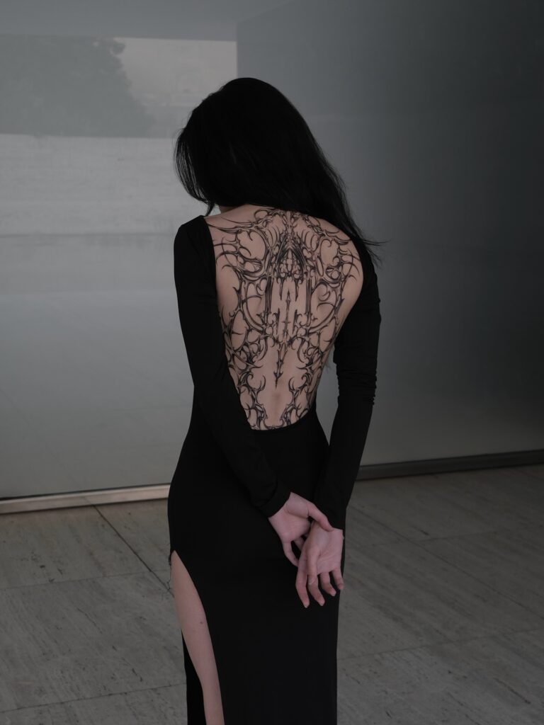 Geometric Dragon Back Tattoo