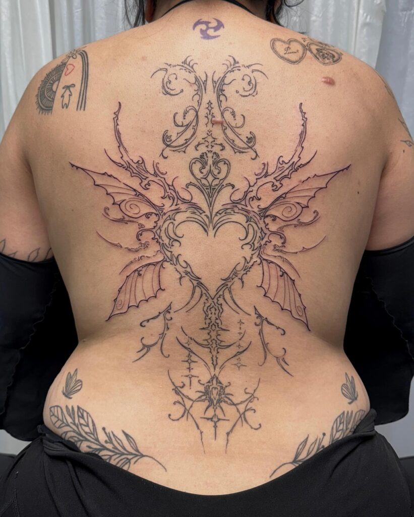 Gothic Floral Back Tattoo With Ornamental Detailing