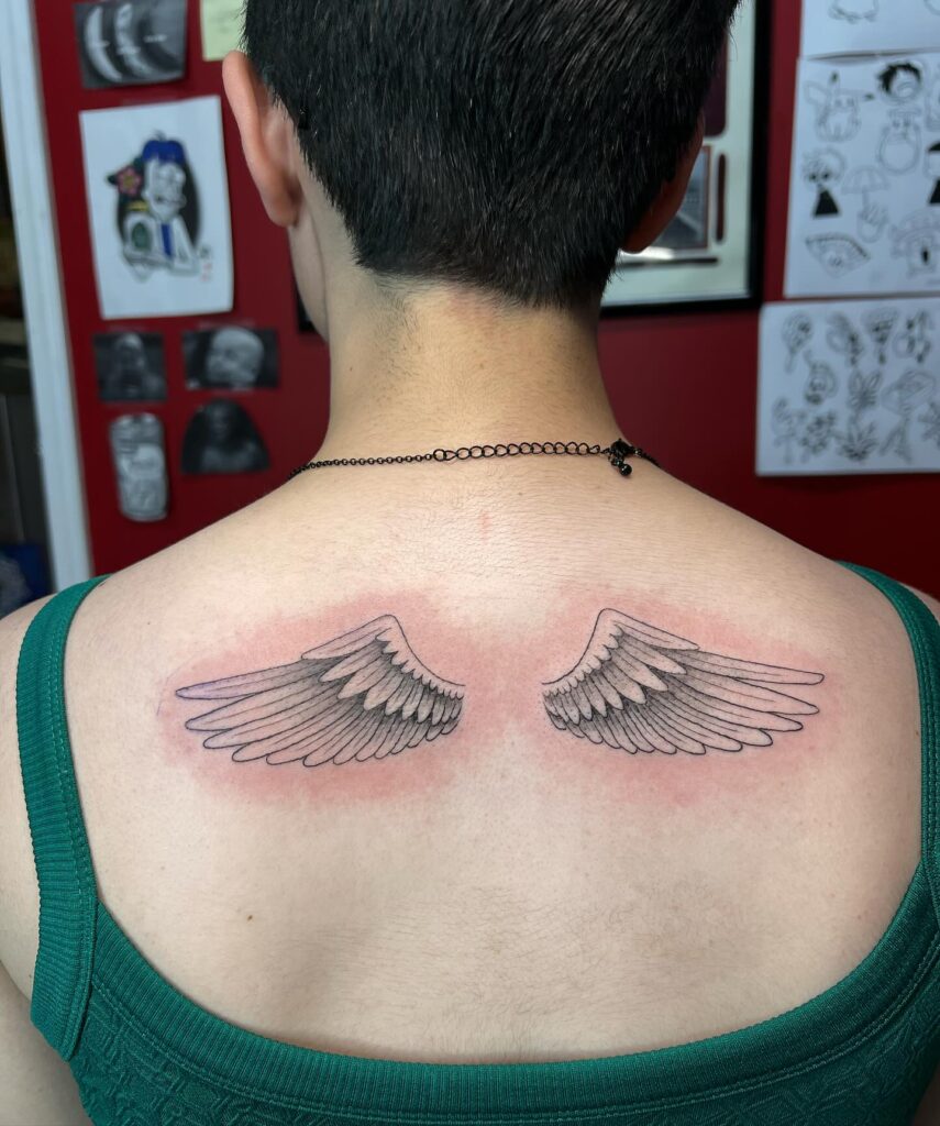 Graceful Shoulder Blade Angel Wings Tattoo angel wings tattoo ideas on back tattoo