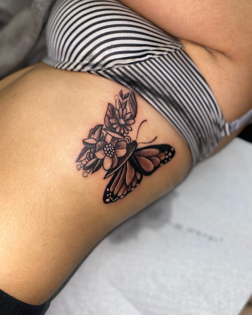 Half Butterfly, Half Bloom Tattoo half butterfly half flower tattoos tattoo