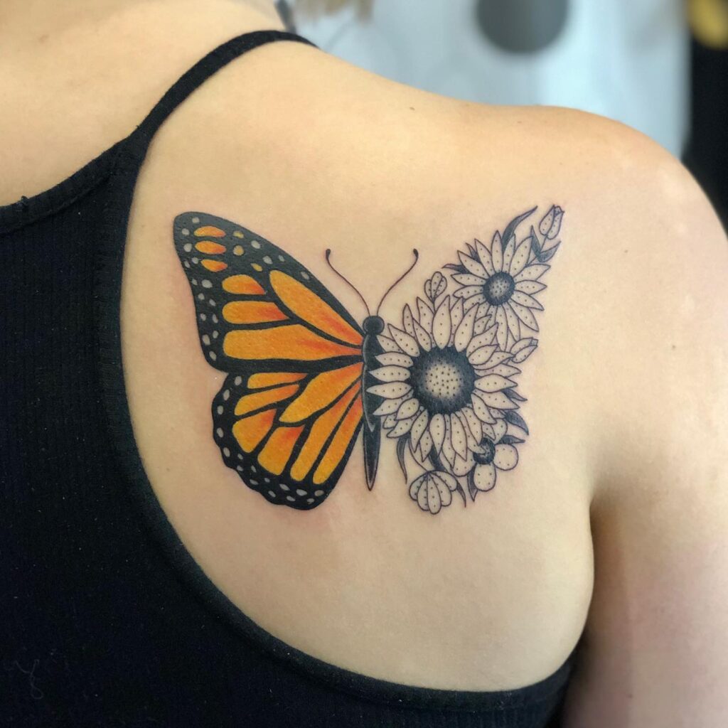 Half monarch butterfly half sunflower tattoo on shoulder