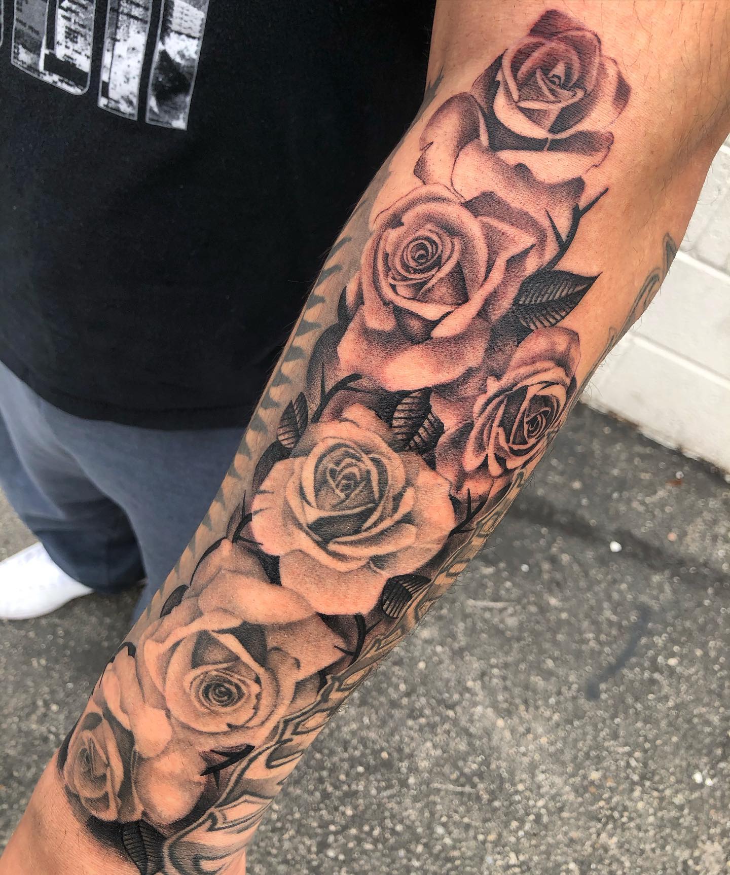 Black And Gray Rose Half Sleeve Tattoo