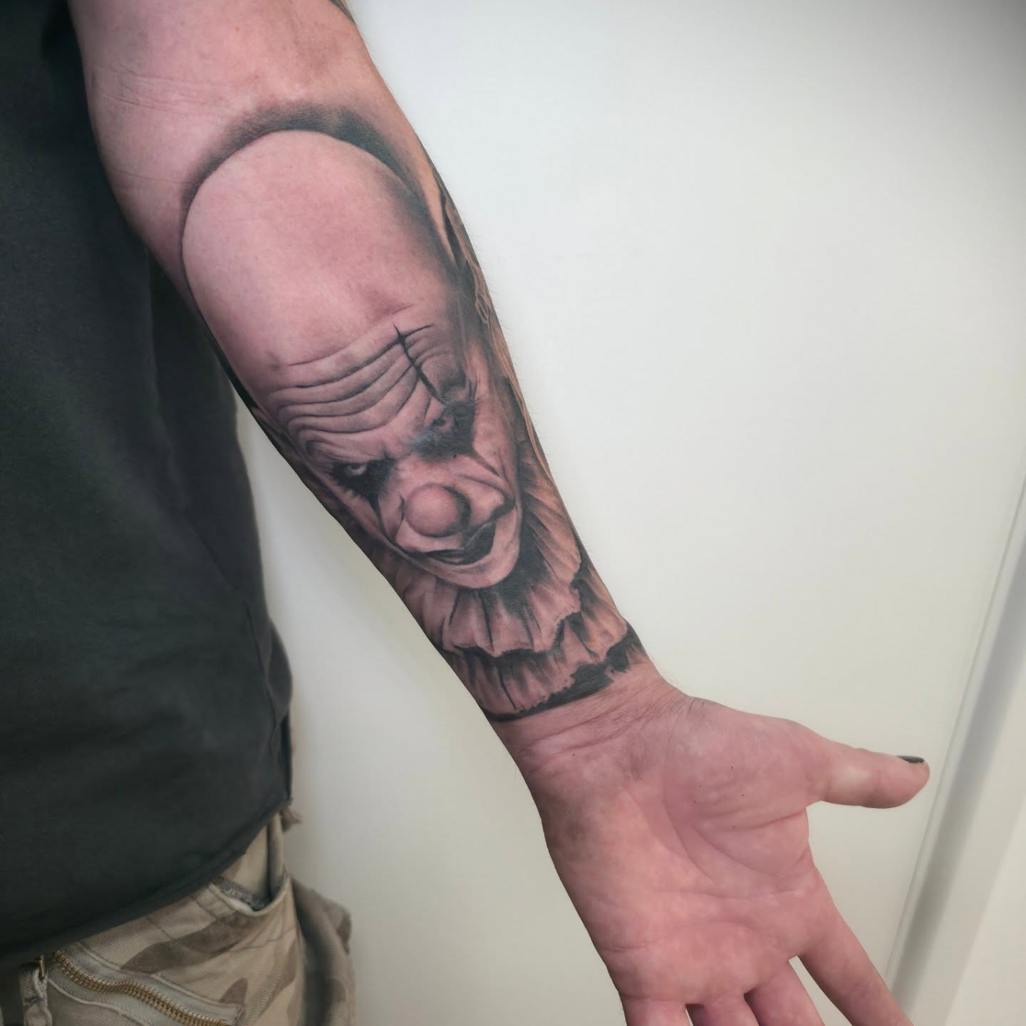 Evil Clown Half Sleeve Tattoo