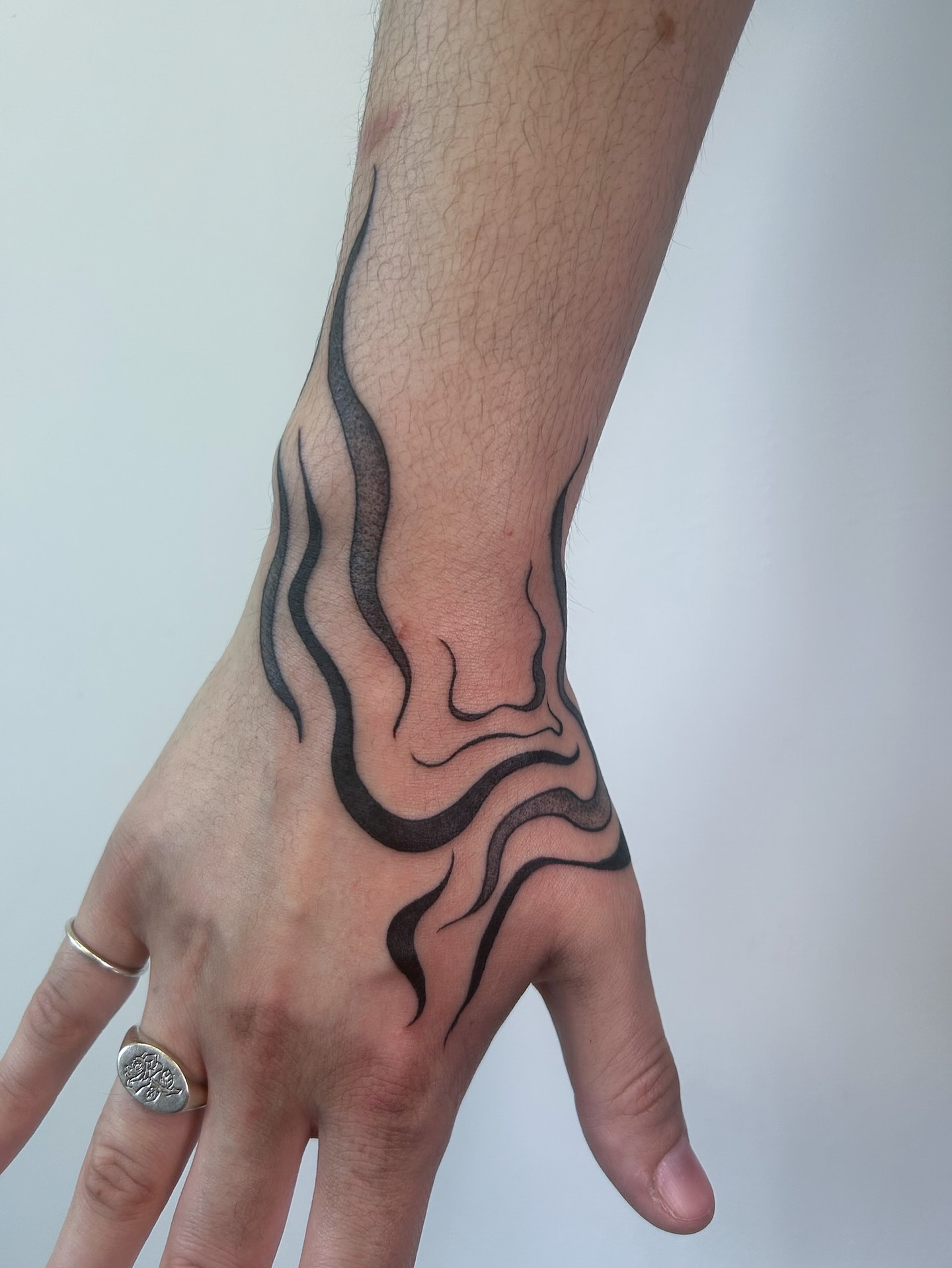 Abstract Flow Hand Tattoo