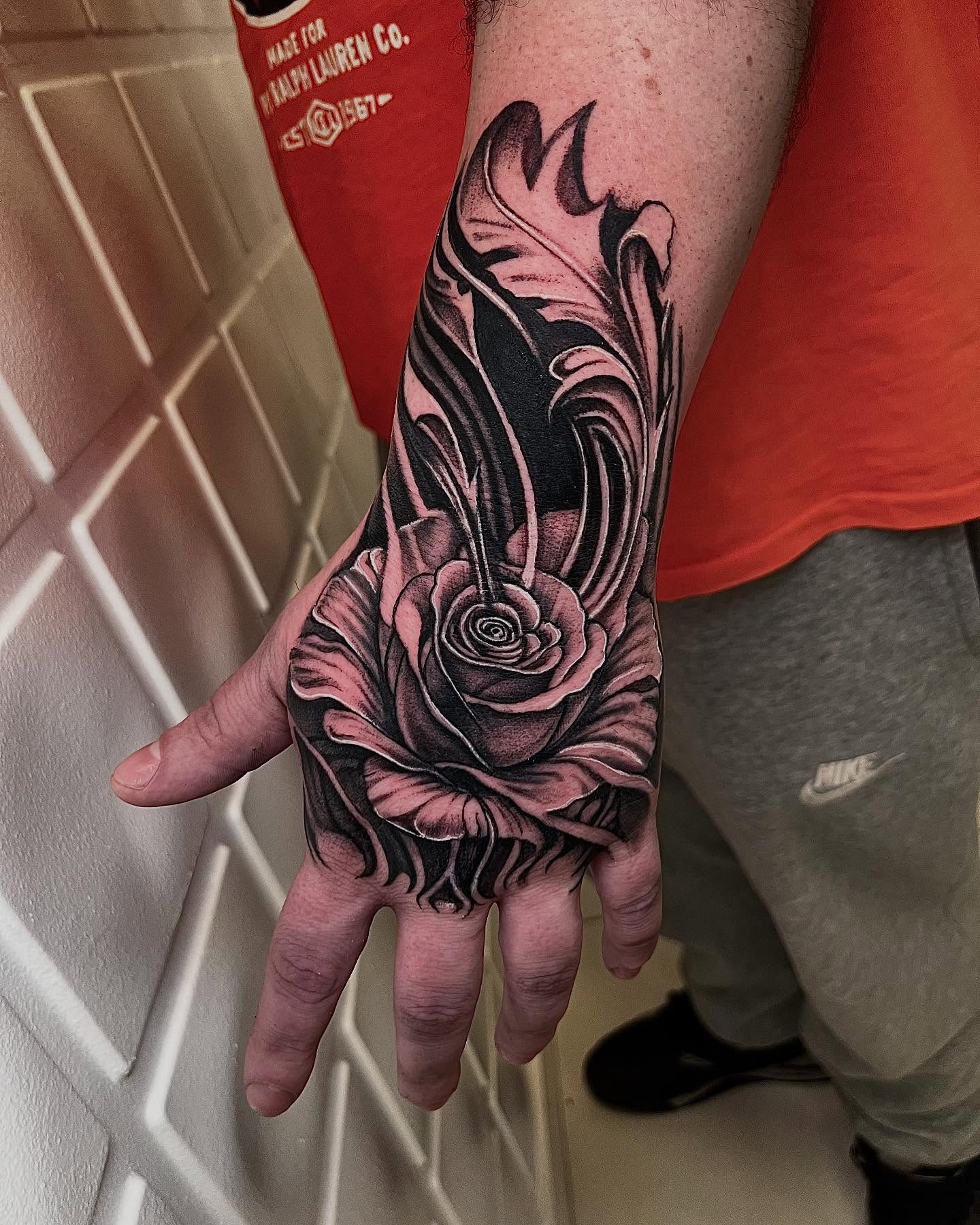 Blackwork Rose Hand Tattoo