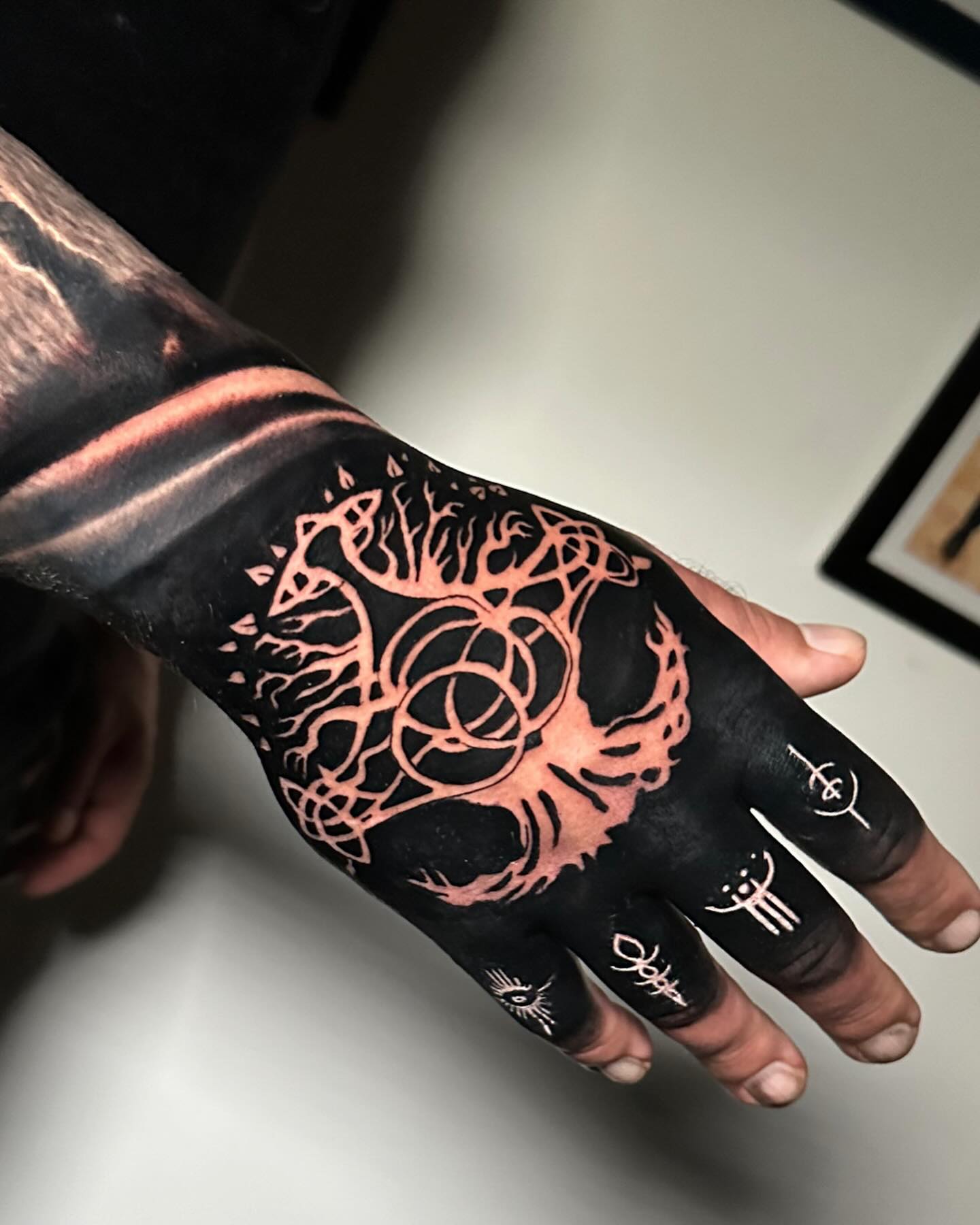 Blackwork Sacred Geometry Wolf Hand Tattoo