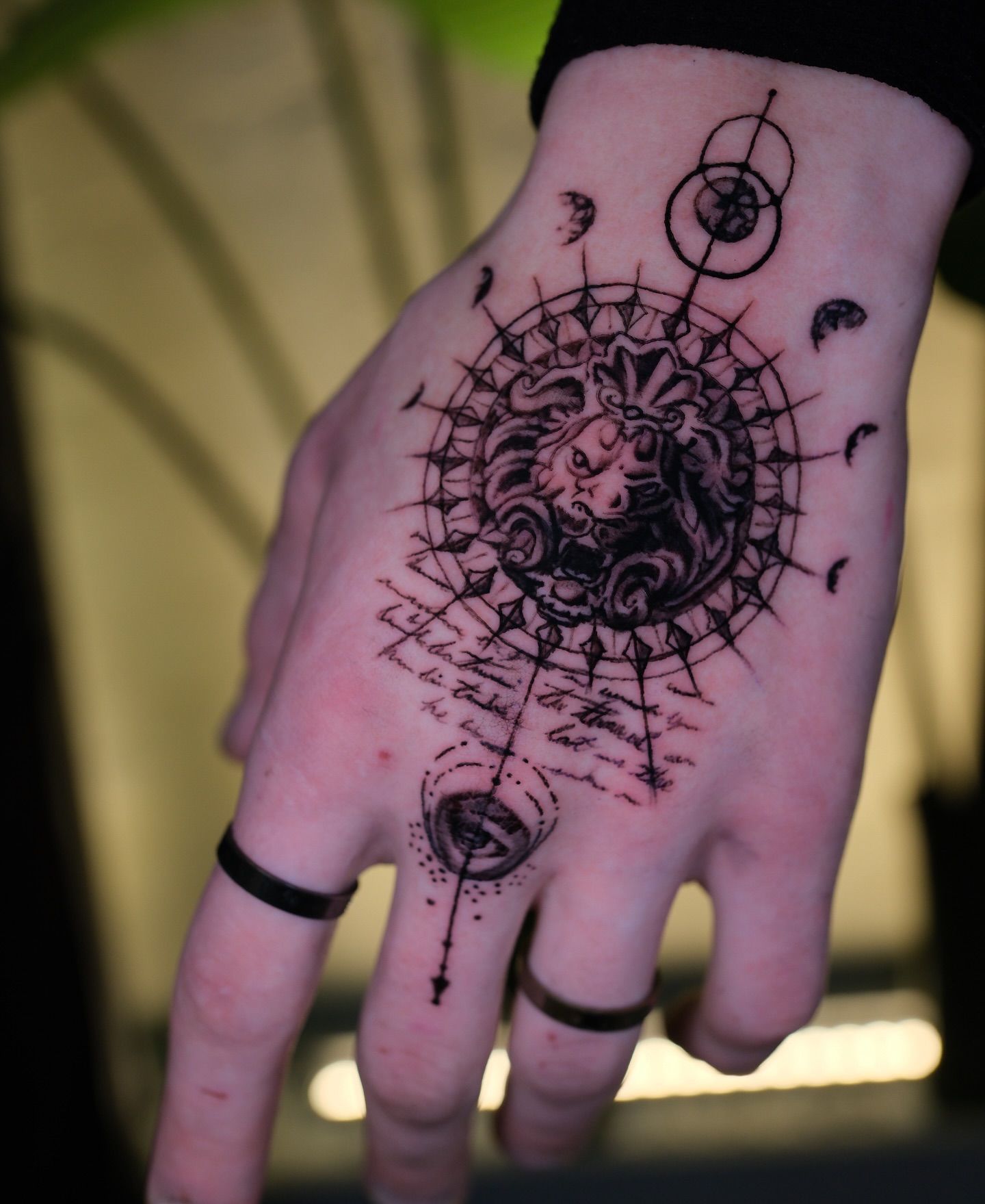 Lion Mandala Hand Tattoo