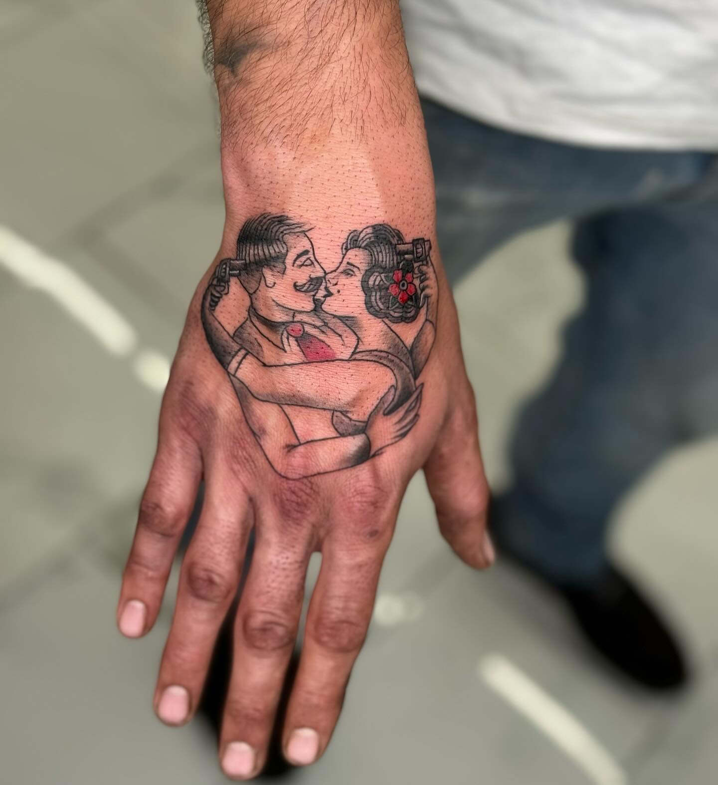 Lovers With Revolvers Hand Tattoo