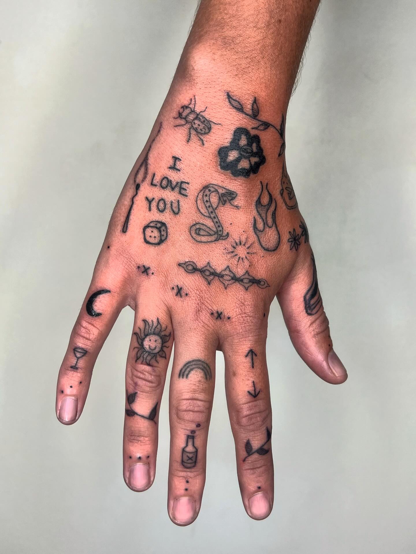 Patchwork Hand Tattoo