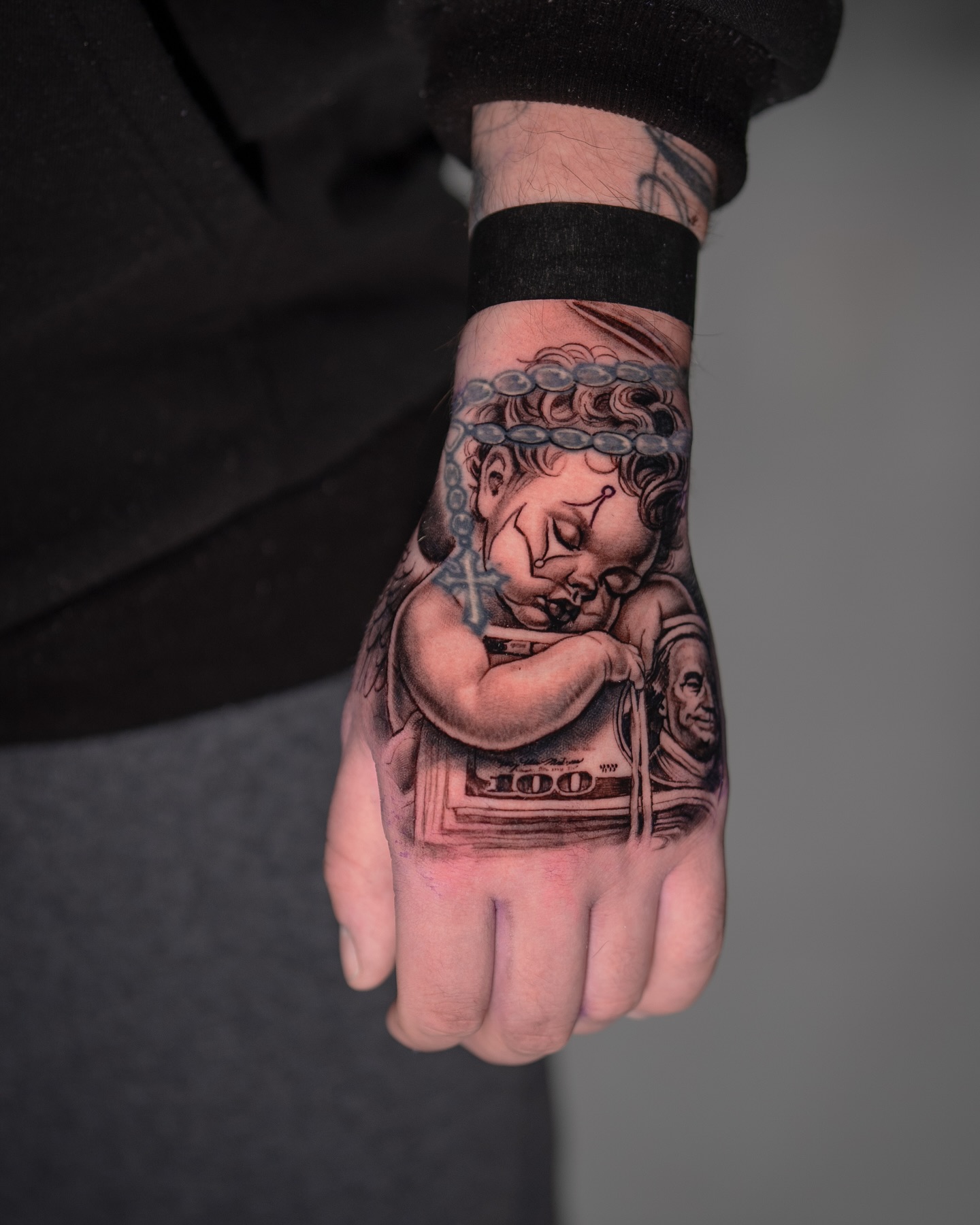 Sleeping Cherub Money Tattoo