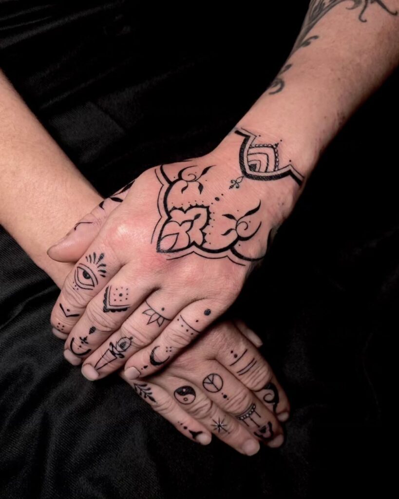 Hands Ornament Tattoo hand tattoo ideas for guys tattoo