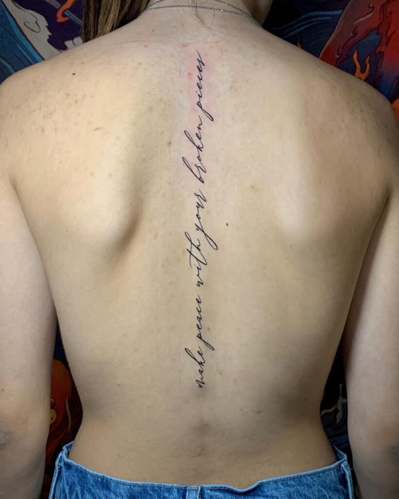 Floral Cross Spine Tattoo