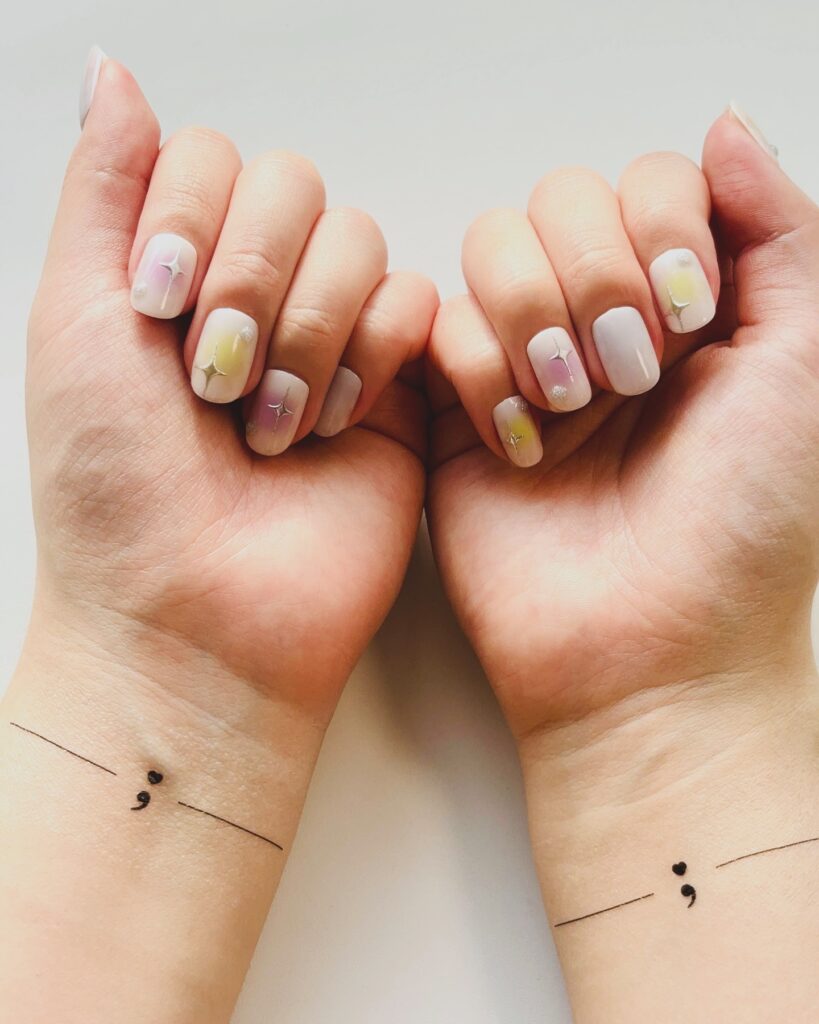 Heart and Semi-Colon Wrist Tattoos meaningful semicolon tattoo ideas tattoo