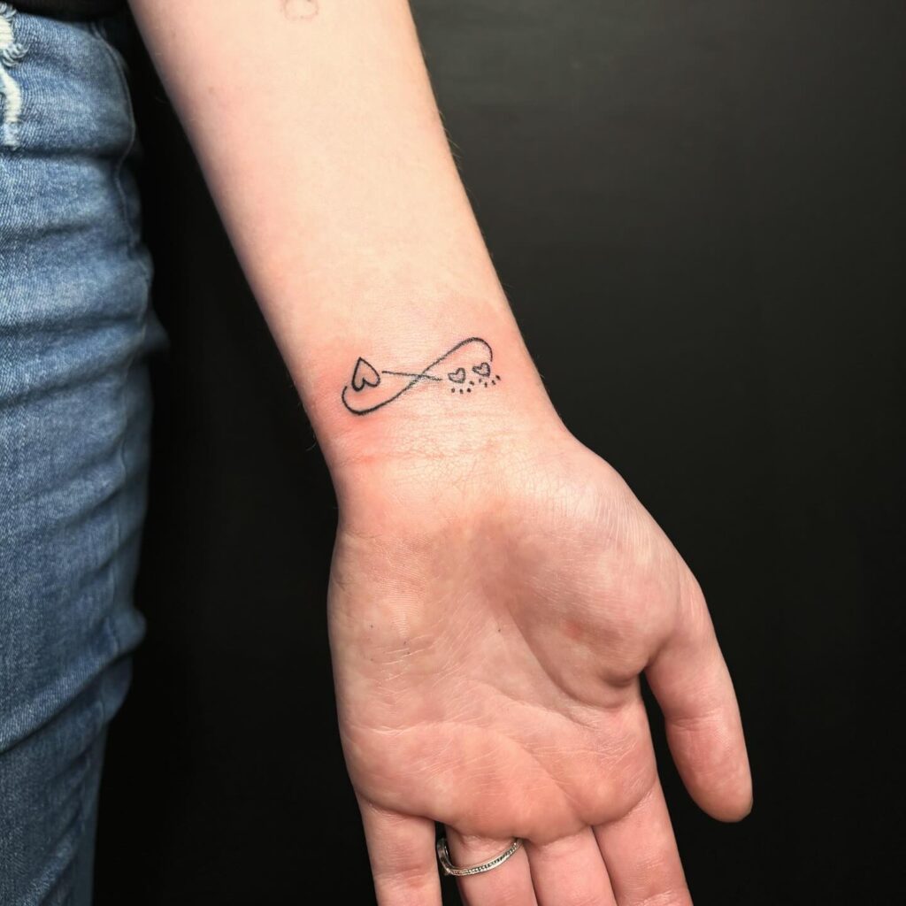 Rose And Leaf Wrist Tattoo