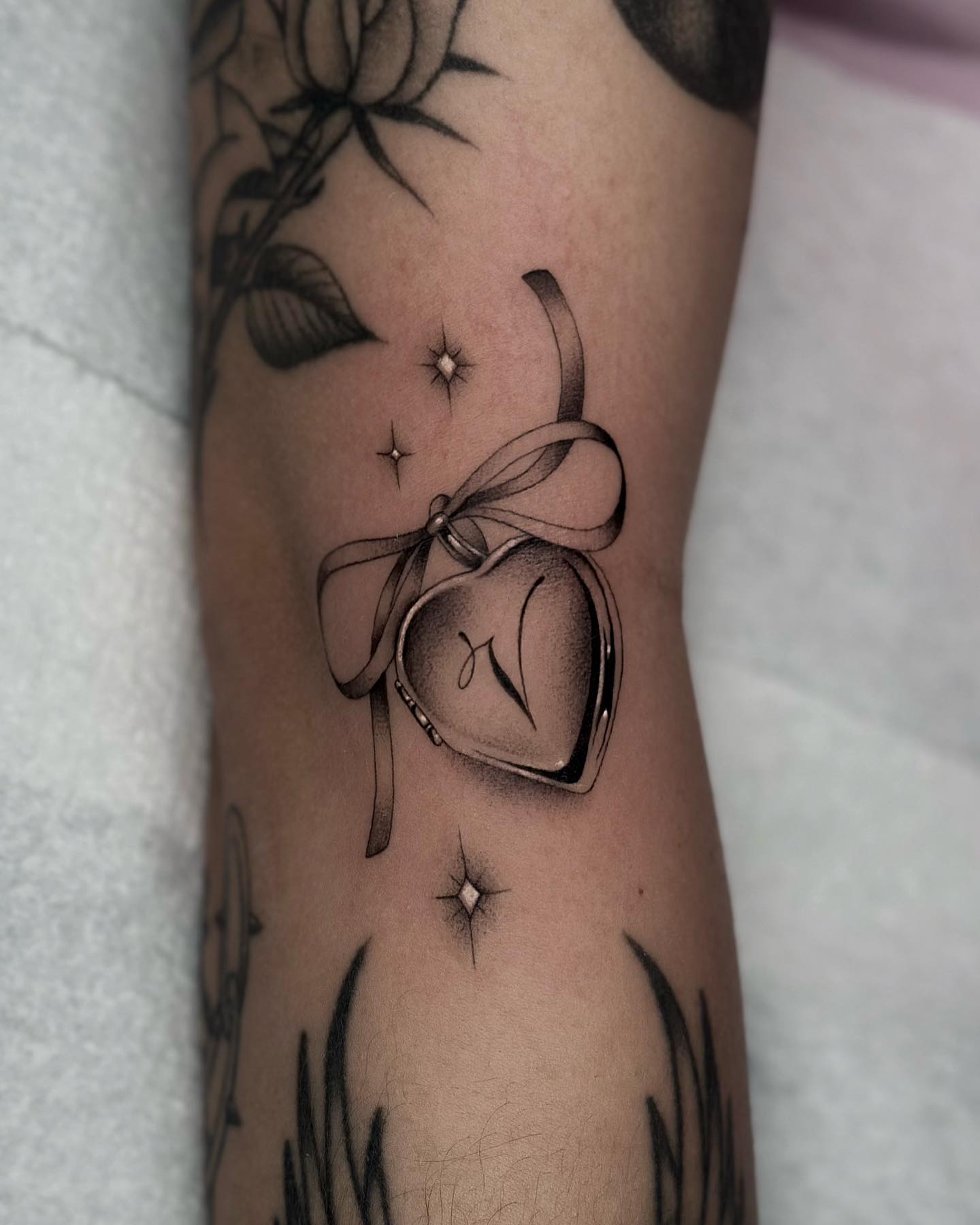 Rosary Cross And Double Locket Tattoo