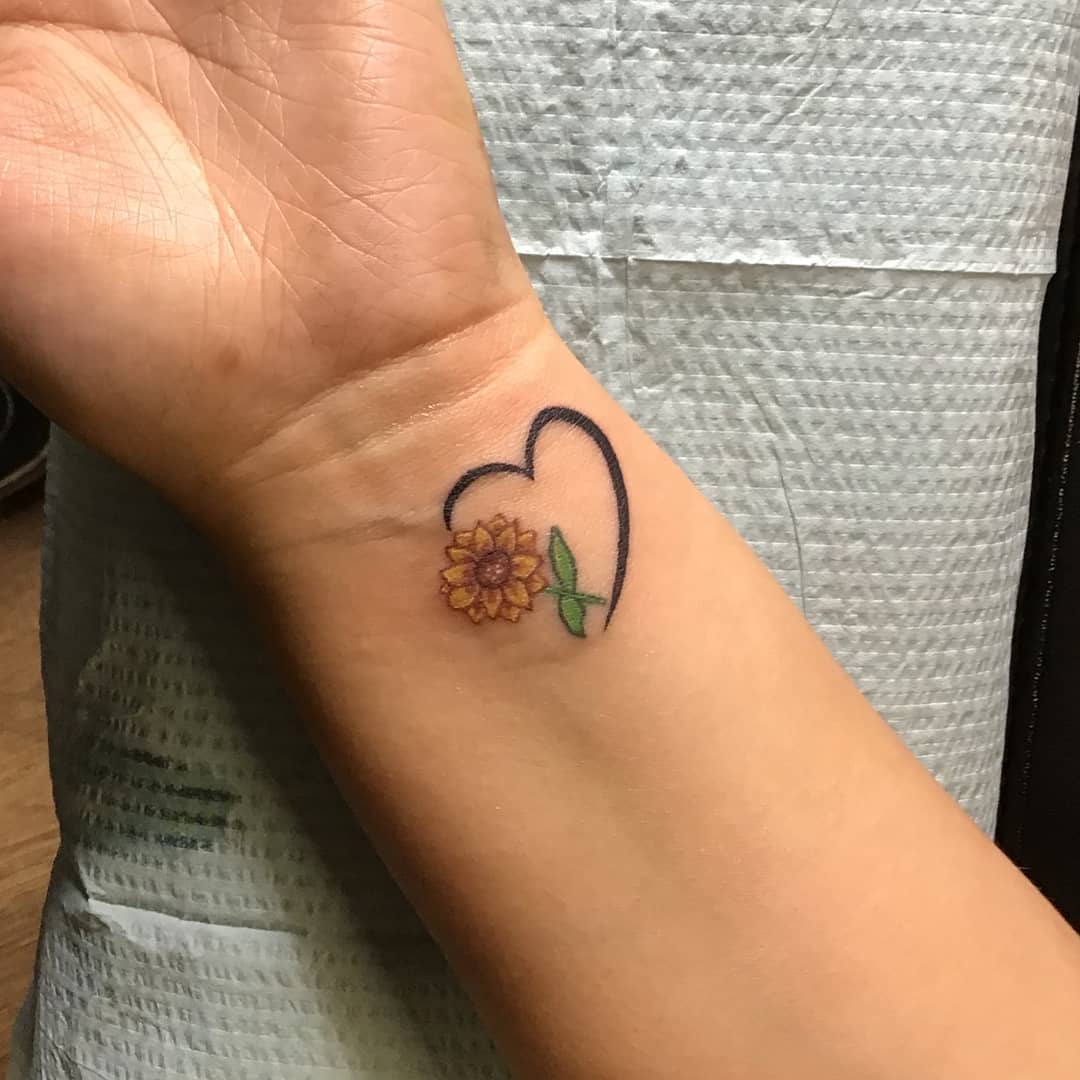 Heart Outline Sunflower Tattoo small sunflower tattoos ideas tattoo