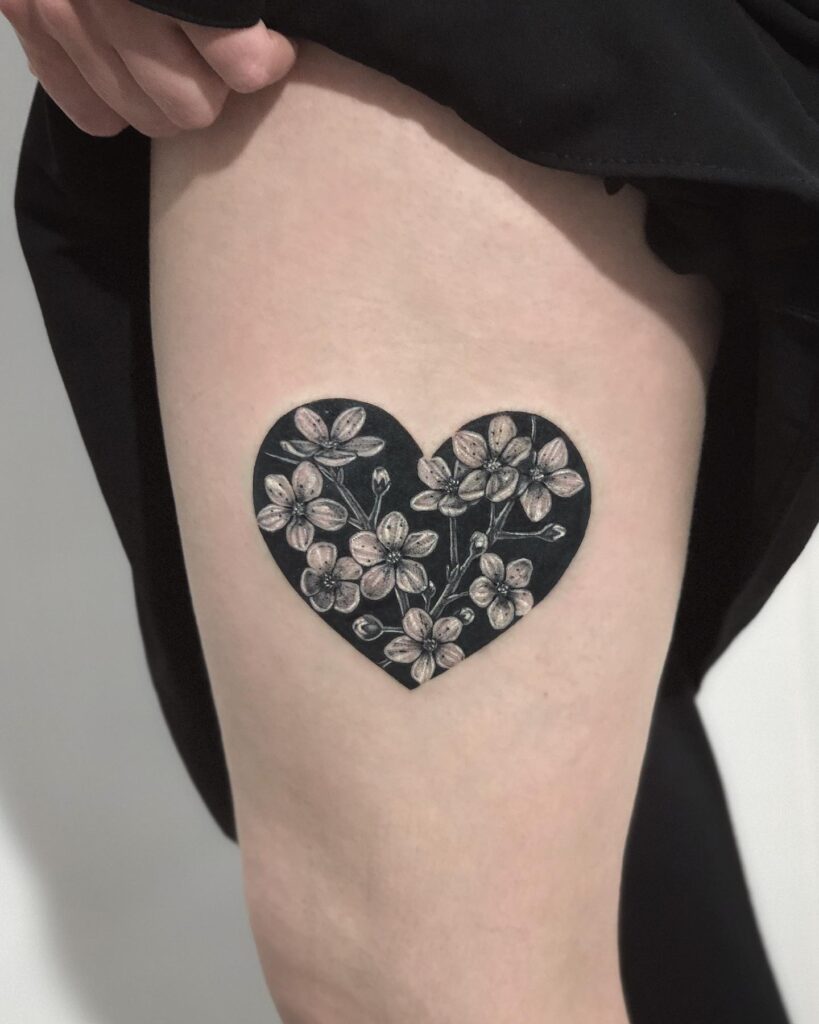 Heart-Shaped Cherry Blossom Silhouette Tattoo cherry blossom tattoo ideas tattoo