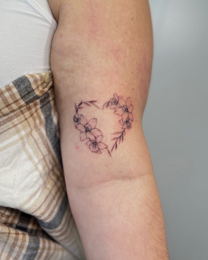 Heart-Shaped Narcissus Flower Tattoo december birth flower tattoo ideas tattoo