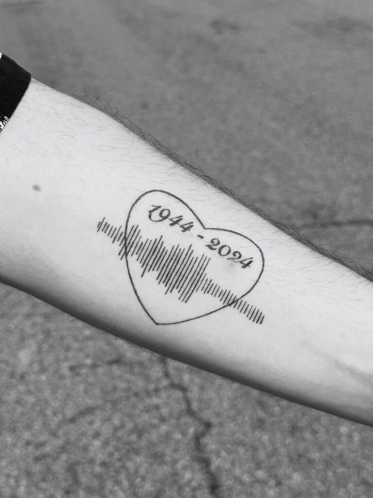 Heart-Shaped Soundwave Dad Memorial Tattoo with Years dad memorial tattoos tattoo