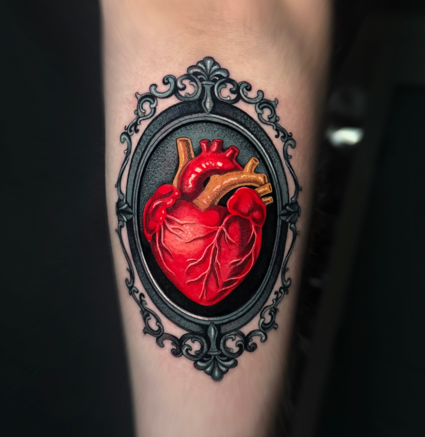 Anatomical Heart In Ornate Frame Tattoo