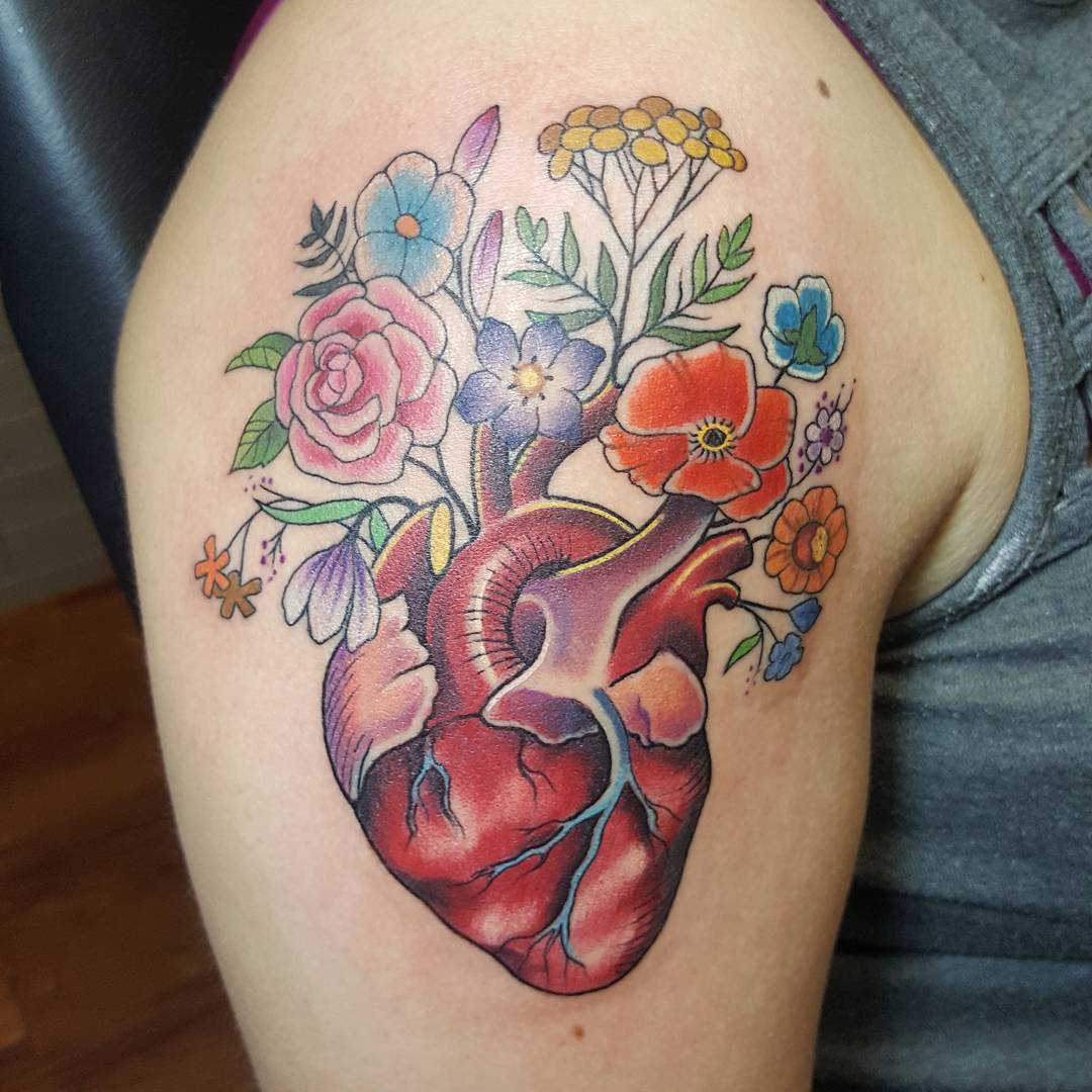 Anatomical Heart With Blooming Wildflowers Tattoo
