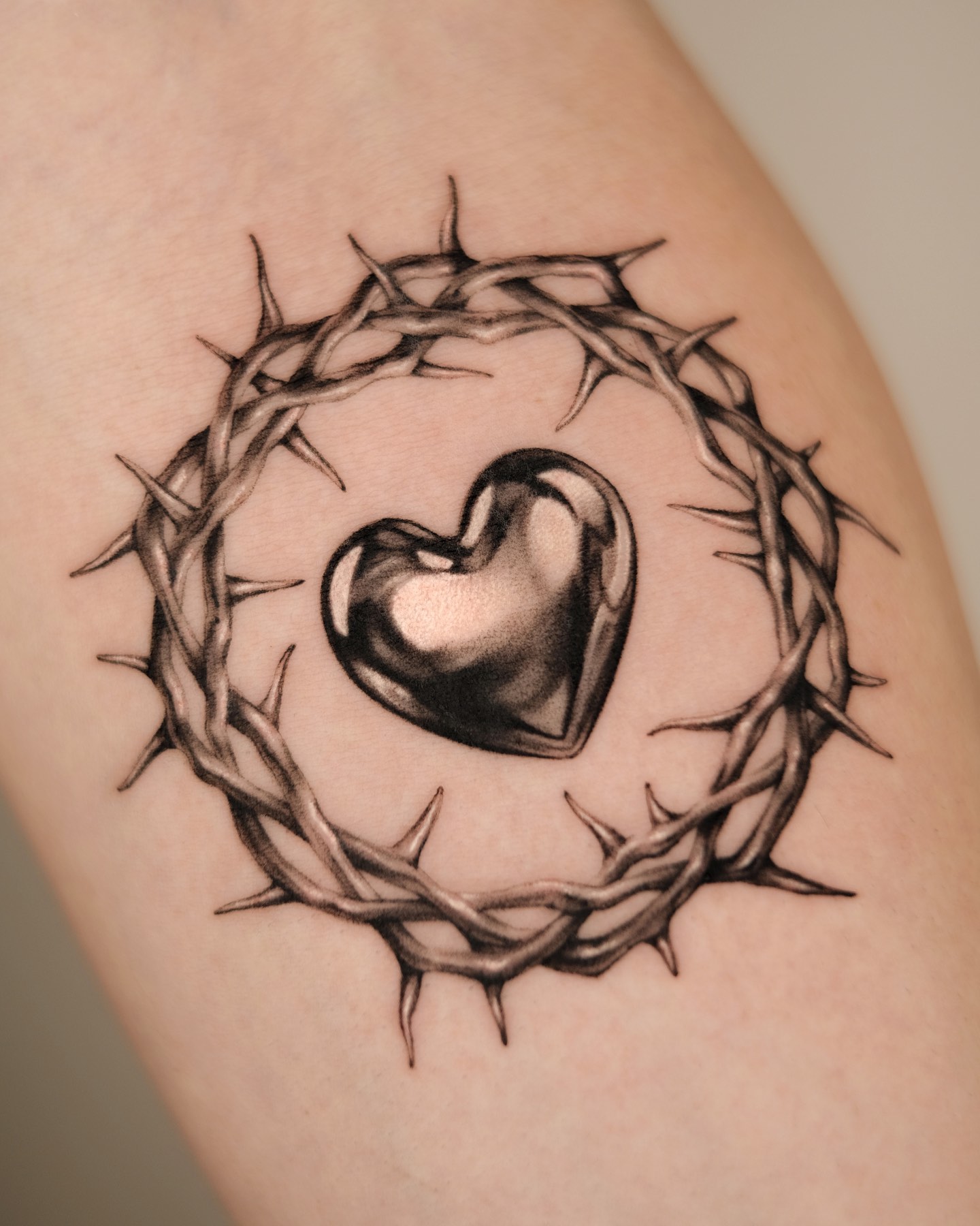 Black Heart With Crown Of Thorns Tattoo