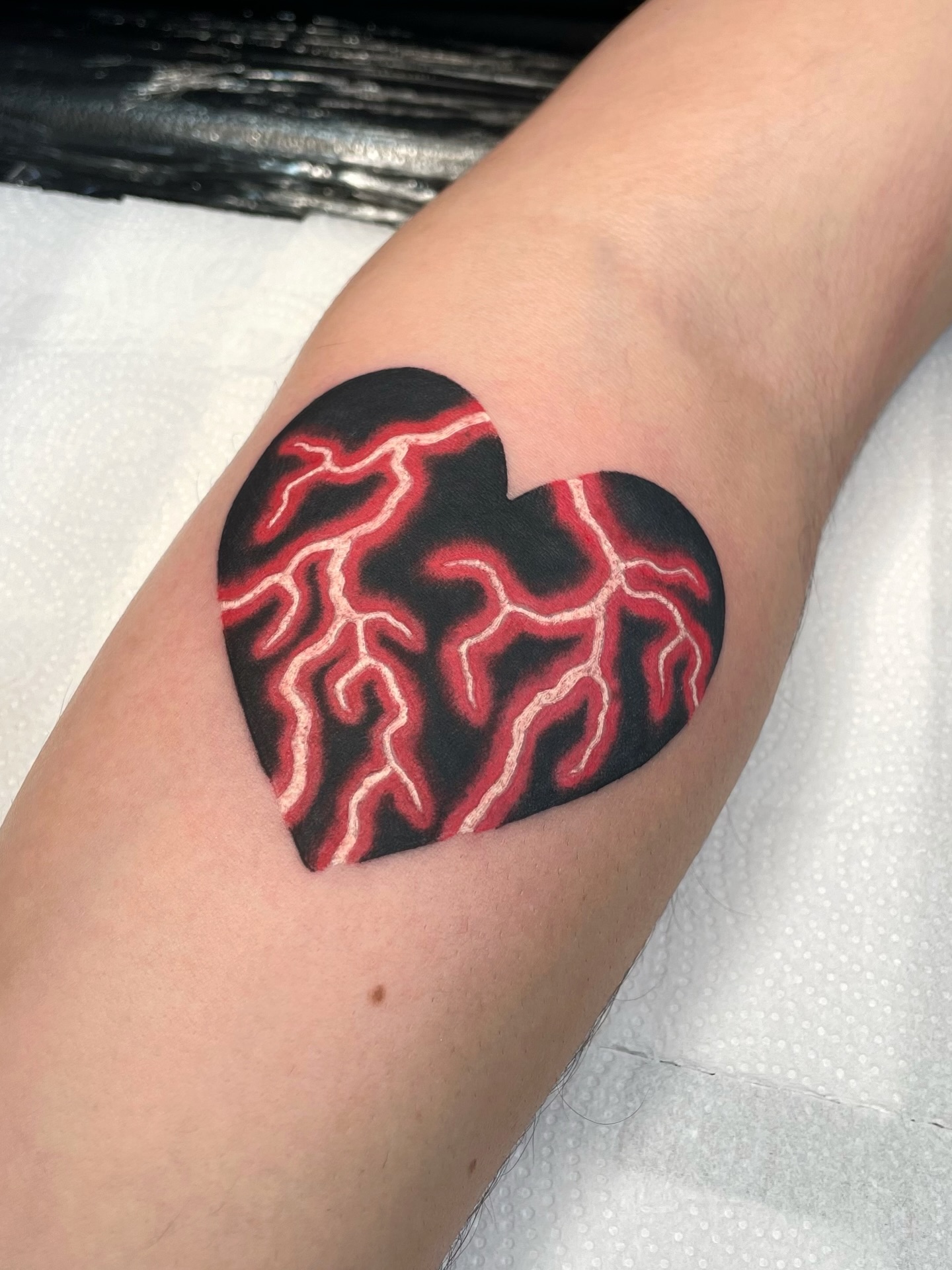 Black Heart With Vein Pattern Tattoo