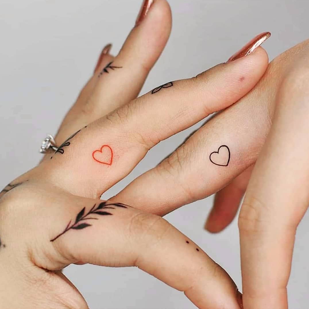 Matching Tiny Heart Finger Tattoos