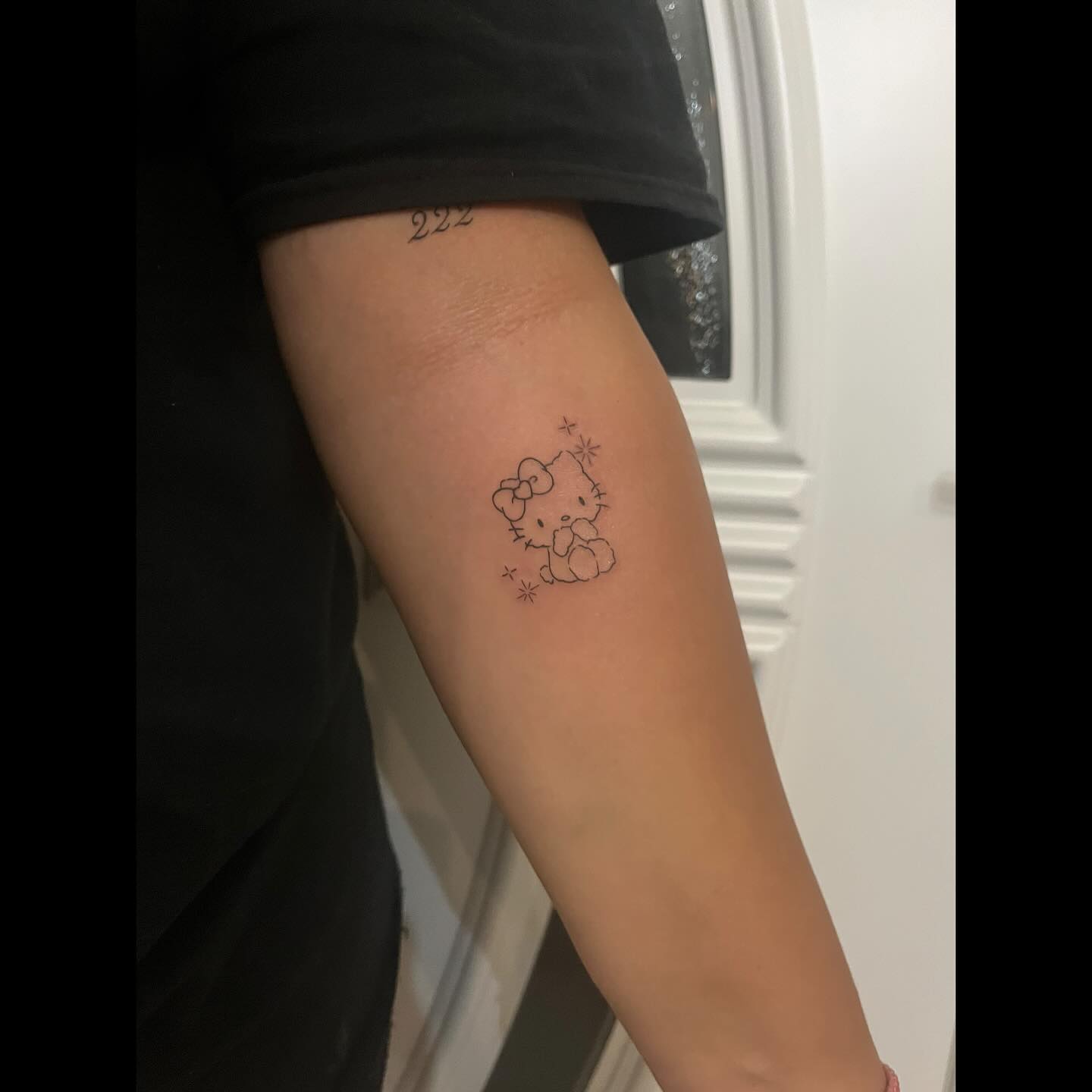 Hello Kitty Forearm Tattoo
