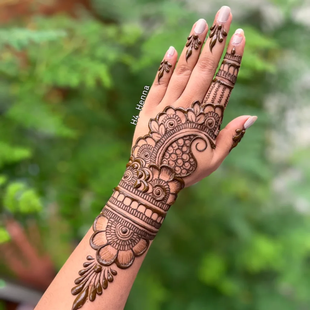 Radial Sunburst Henna on Back of Hand henna tattoo