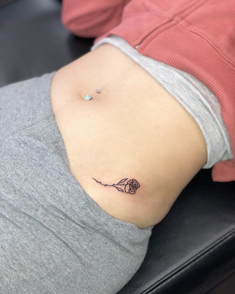 Small tattoo on the high hip bone