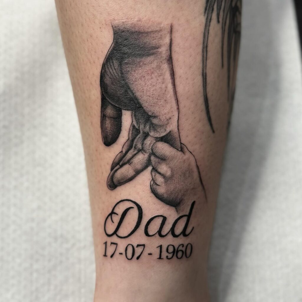 Holding Hands Dad Memorial Tattoo with Birthdate dad memorial tattoos tattoo