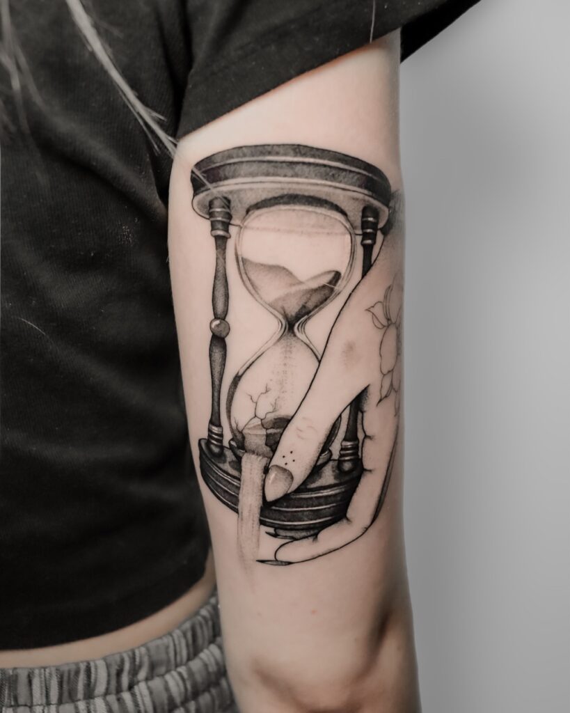Hourglass and Cascading Sand Arm Tattoo hourglass tattoo ideas tattoo