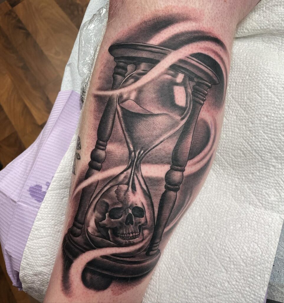 Hourglass with Skull and Swirling Shadows hourglass tattoo ideas tattoo