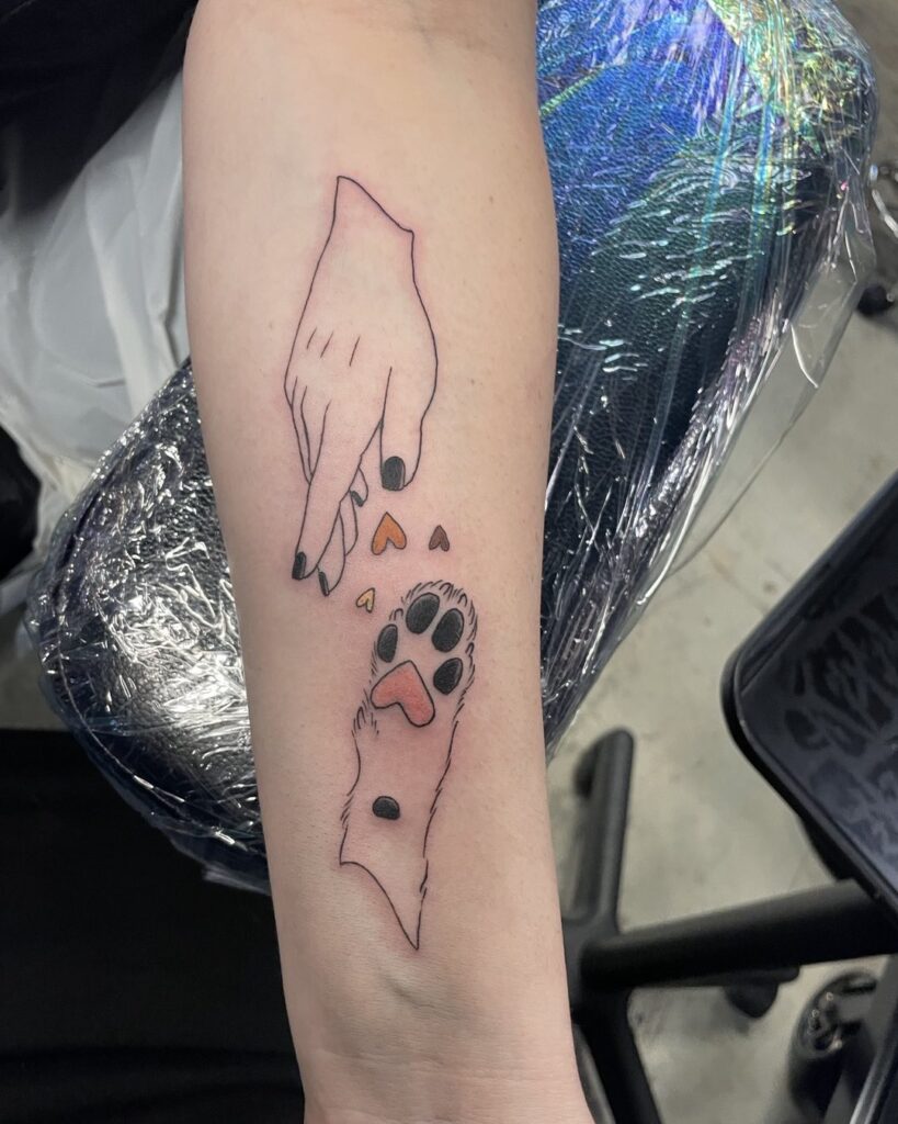 Human Hand and Paw Connection Tattoo dog memorial tattoos tattoo