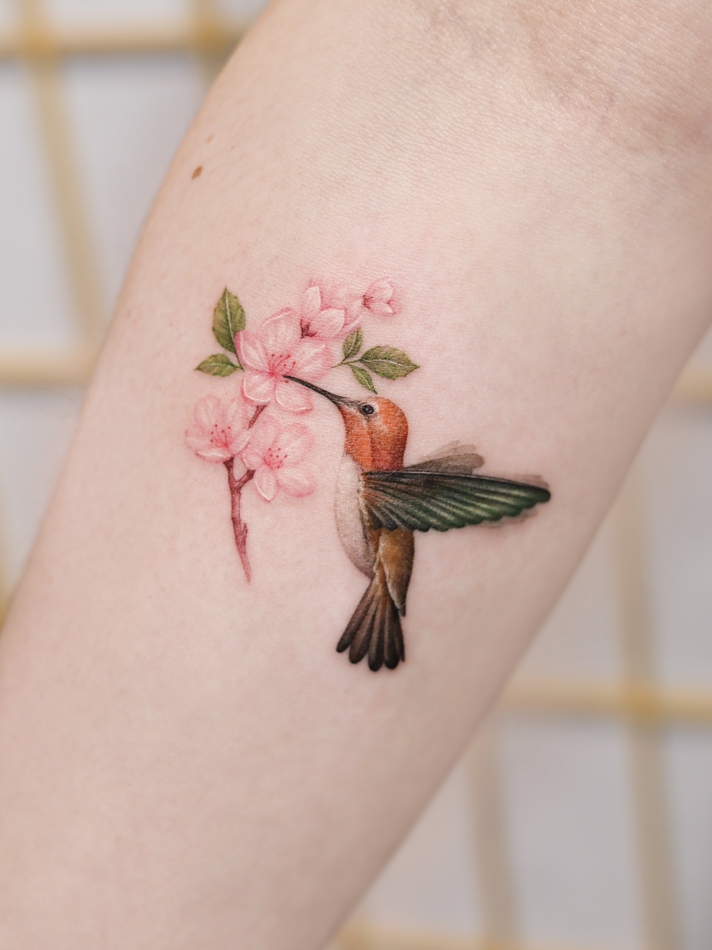 Hummingbird and Cherry Blossom Tattoo hummingbird tattoos ideas tattoo