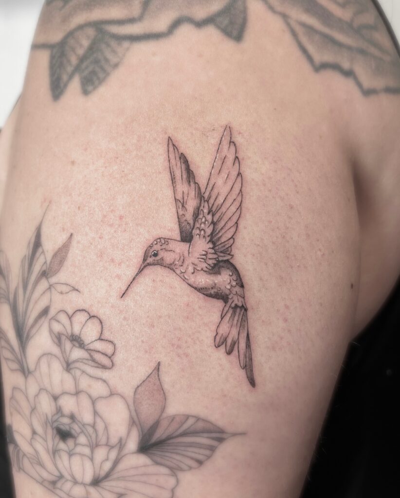 Hummingbird in Flight with Blooming Flowers hummingbird tattoos tattoo
