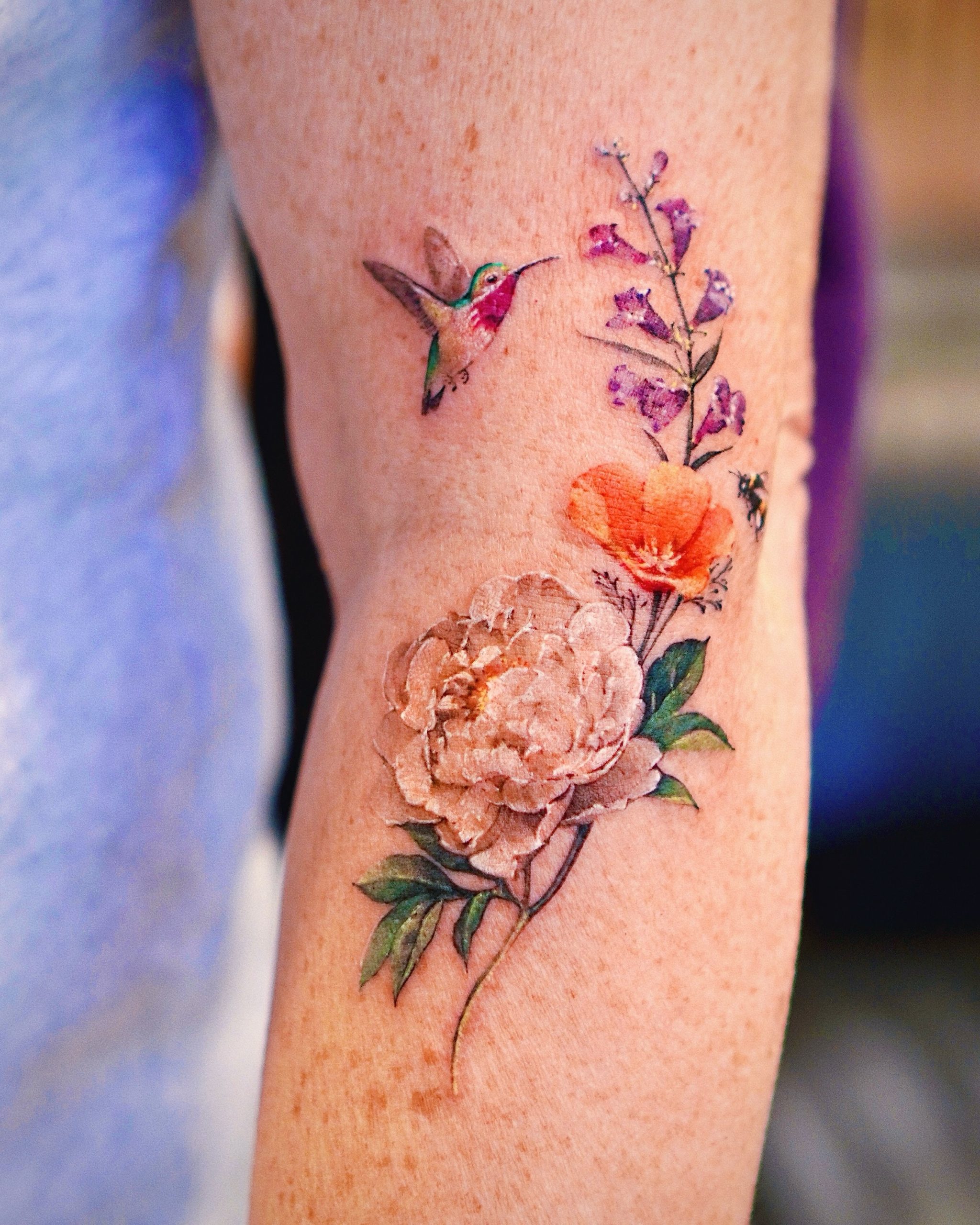 Hummingbird with Wildflower Bouquet Tattoo hummingbird tattoos ideas tattoo
