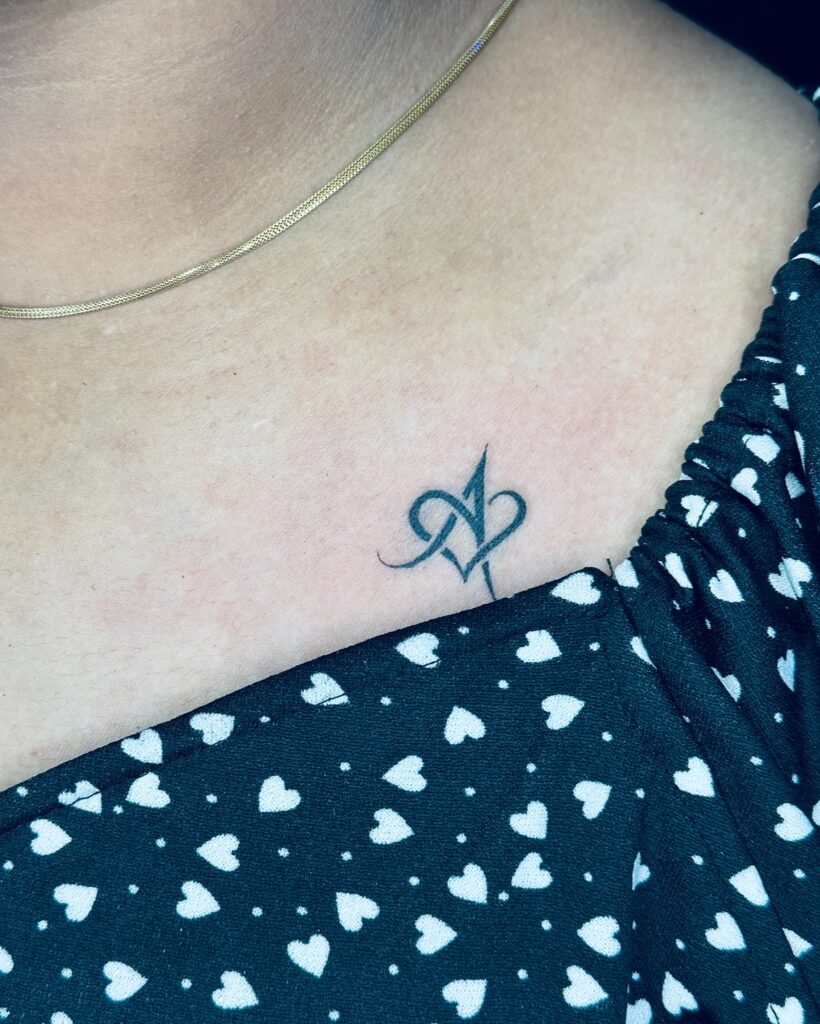 Elegant Lily Name Collarbone Tattoo
