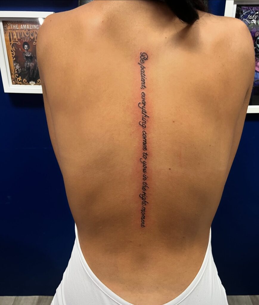 Delicate Wildflower Vine Spine Tattoo