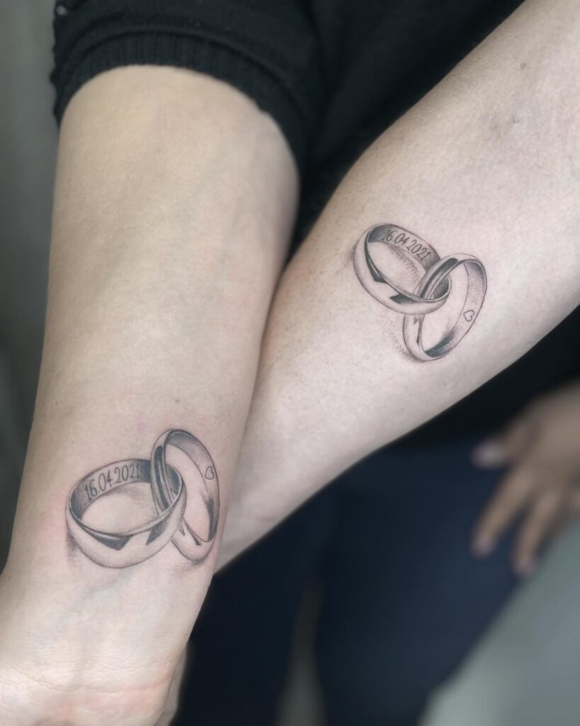 Interlocked Wedding Rings Tattoos
