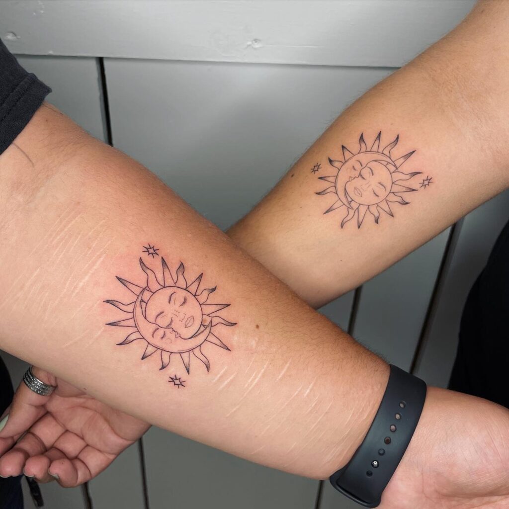 Kissing sun and moon matching forearm tattoos