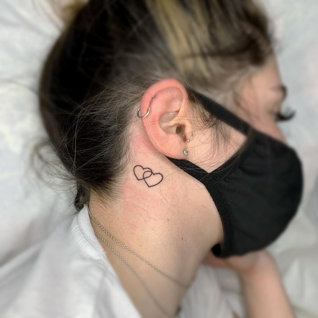 Unalome and Lotus Behind-the-Ear Tattoo behind the ear tattoos tattoo