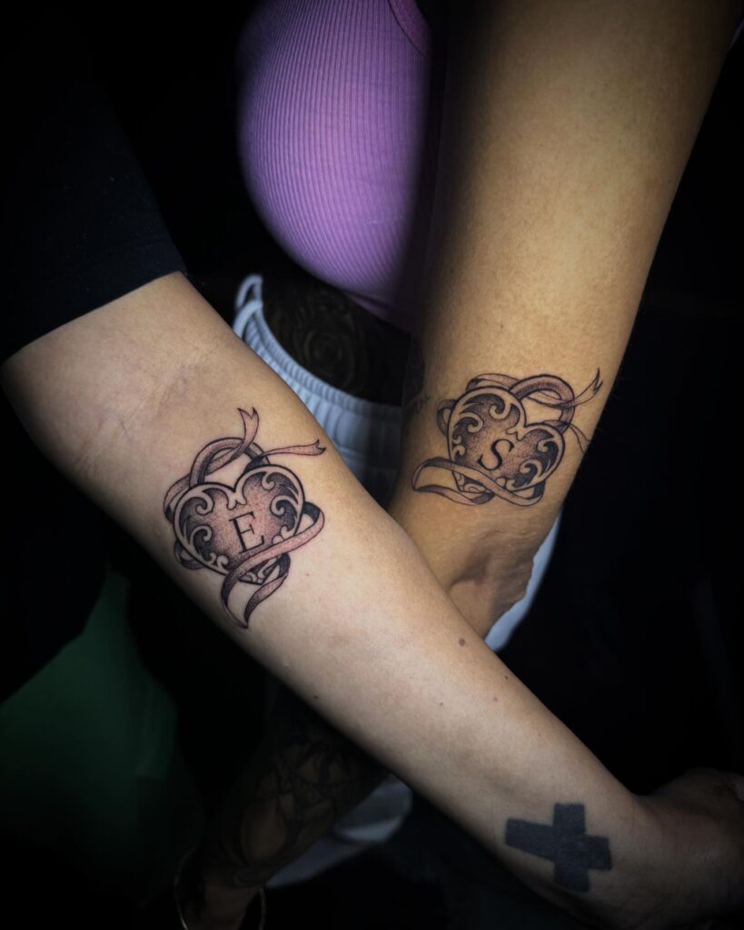 Intertwined Hearts sisters tattoos tattoo
