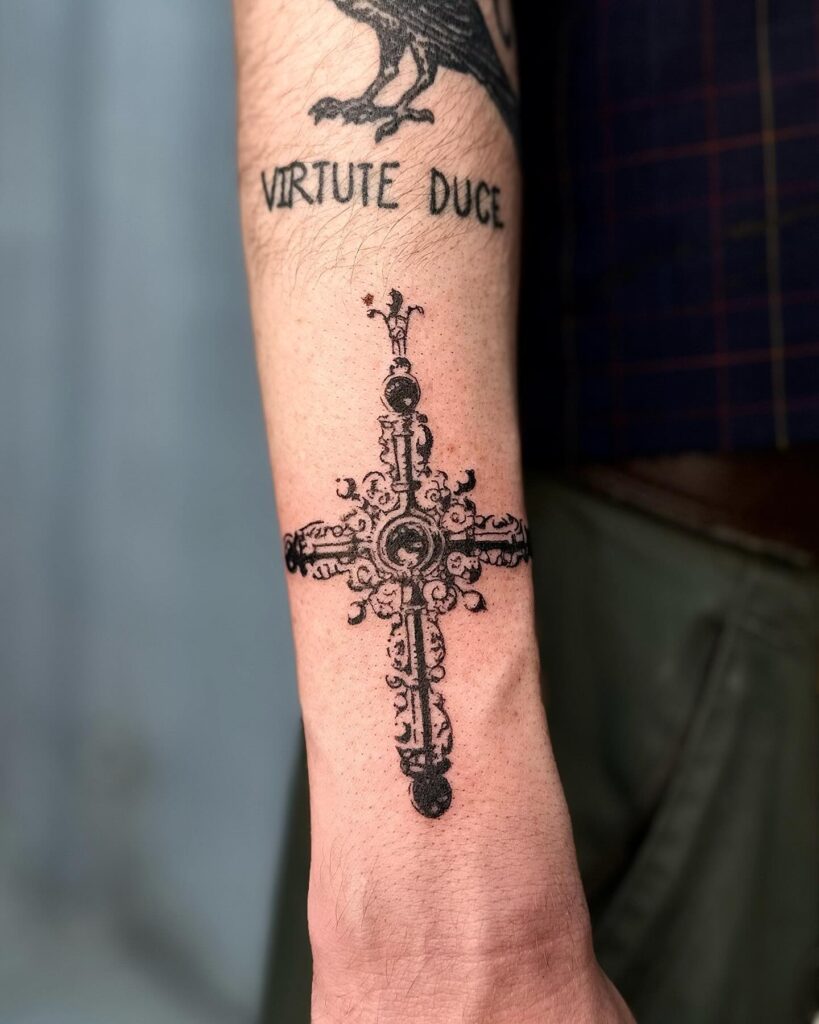 Intricate Baroque-Style Cross Forearm Tattoo cross tattoos for men tattoo