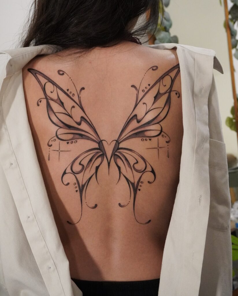Lily Upper Arm Tattoo